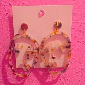 Face shaped earrings